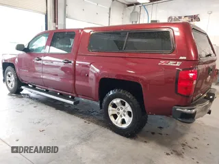 2014 Chevrolet Silverado 1500 LT with VIN 3GCUKREC9EG358476, listed as a IAAI auction lot 41866756 with 210,880 mi miles and . Bid and sale history available at DreamBid. Image 3.