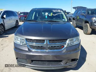 2015 Dodge Journey SE z VIN 3C4PDCAB5FT739266, wystawiony jako IAAI lot #41725086 z przebiegiem 134 109 mil mil oraz . Historia ofert i sprzedaży dostępna na DreamBid. Obrazek 12.