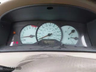 2003 Toyota Corolla CE with VIN 1NXBR32E73Z137535, listed as a IAAI auction lot 42041727 with 243,586 mi miles. Bid and sale history available at carsss.com. Image 7.