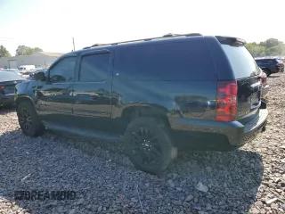 2014 Chevrolet Suburban LT with VIN 1GNSKJE72ER131763, listed as a Copart auction lot 69026754 with 186,248 mi miles and Salvage Title. Bid and sale history available at carsss.com. Image 2.