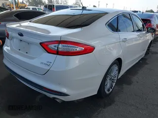 2013 Ford Fusion SE Hybrid z VIN 3FA6P0LU1DR310075, wystawiony jako IAAI lot #42085556 z przebiegiem Nie podano mil oraz . Historia ofert i sprzedaży dostępna na DreamBid. Obrazek 4.
