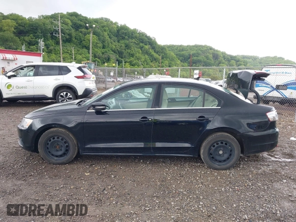 2013 Volkswagen Jetta SE z VIN 3VWDP7AJXDM289031, wystawiony jako IAAI lot #42325596 z przebiegiem 157 774 mil mil oraz . Historia ofert i sprzedaży dostępna na DreamBid. Obrazek 14.