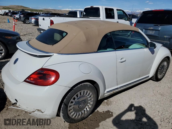 2014 Volkswagen Beetle 1.8T with VIN 3VW517AT4EM818949, listed as a Copart auction lot 49615915 with 103,682 mi miles and Salvage title. Bid and sale history available at DreamBid. Image 3.