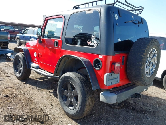 2004 Jeep Wrangler Sport Right Hand Drive with VIN 1J4F449S74P796957, listed as a IAAI auction lot 41987562 with 106,730 mi miles and . Bid and sale history available at carsss.com. Image 3.