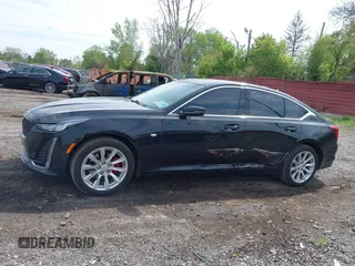 2021 Cadillac CT5 Luxury z VIN 1G6DX5RKXM0146235, wystawiony jako IAAI lot #42214676 z przebiegiem 72 847 mil mil oraz . Historia ofert i sprzedaży dostępna na DreamBid. Obrazek 14.