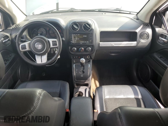 2016 Jeep Compass Sport with VIN 1C4NJCBA1GD590058, listed as a Copart auction lot 62504725 with 211,325 mi miles and Salvage title. Bid and sale history available at DreamBid. Image 8.