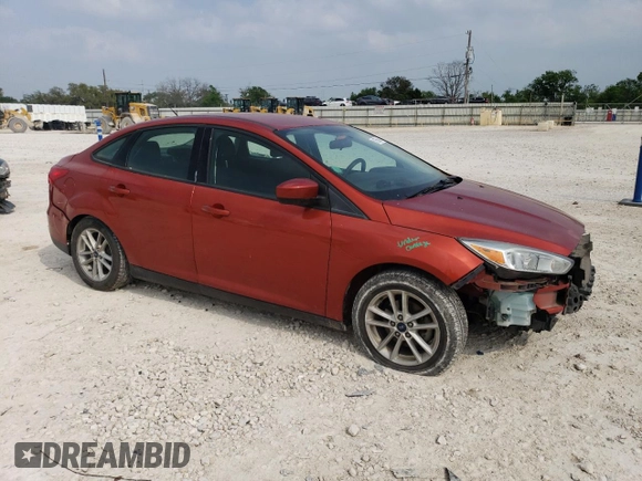 2018 Ford Focus SE z VIN 1FADP3F21JL269539, wystawiony jako Copart lot #51655945 z przebiegiem 88 133 mil mil oraz Szkoda całkowita • Salvage title. Historia ofert i sprzedaży dostępna na DreamBid. Obrazek 4.