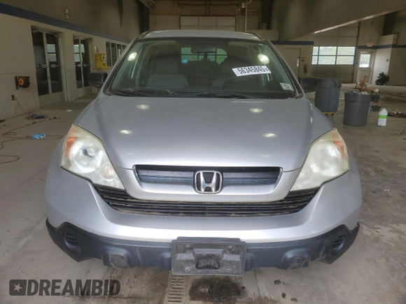 2009 Honda CR-V LX z VIN 5J6RE48379L037194, wystawiony jako Copart lot #56345845 z przebiegiem 297 317 mil mil oraz Czysty tytuł • Clean title. Historia ofert i sprzedaży dostępna na DreamBid. Obrazek 5.