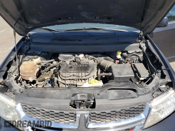 2013 Dodge Journey SXT with VIN 3C4PDDBG6DT639884, listed as a Copart auction lot 64623635 with 206,809 mi miles and Clean title. Bid and sale history available at DreamBid. Image 12.