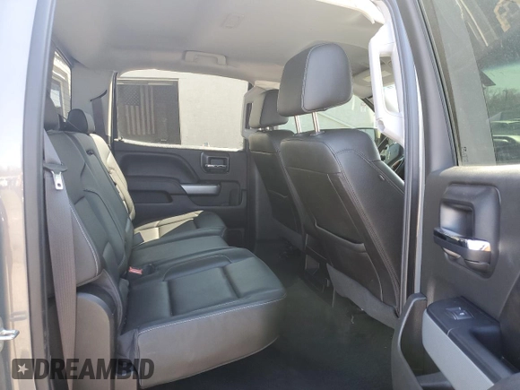 2017 Chevrolet Silverado 1500 LT with VIN 3GCUKREC0HG335785, listed as a Copart auction lot 51456305 with 104,614 mi miles and Salvage Title. Bid and sale history available at DreamBid. Image 10.