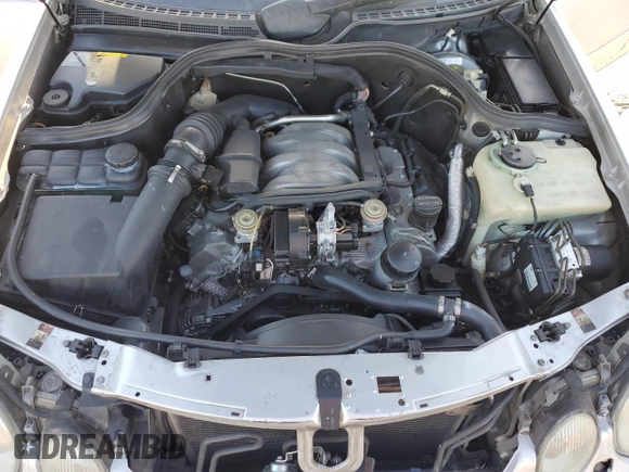 1999 Mercedes-Benz CLK 320/430 z VIN WDBLK65G2XT024808, wystawiony jako Copart lot #85336294 z przebiegiem 289 898 mil mil oraz Szkoda całkowita • Salvage title. Historia ofert i sprzedaży dostępna na DreamBid. Obrazek 13.