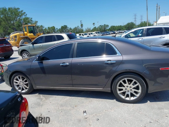 2011 Chevrolet Malibu LTZ with VIN 1G1ZE5E75BF184694, listed as a IAAI auction lot 42002433 with 185,724 mi miles and . Bid and sale history available at DreamBid. Image 14.