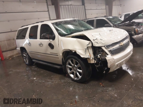 2010 Chevrolet Suburban LTZ with VIN 1GNUKKE32AR271253, listed as a IAAI auction lot 41161374 with 164,184 mi miles. Bid and sale history available at carsss.com. Image 1.