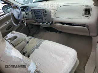 1998 Ford F-150 XL with VIN 1FTRX18L7WNB60346, listed as a Copart auction lot 51526795 with 290,180 mi miles and Salvage title. Bid and sale history available at DreamBid. Image 8.