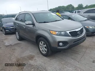 2013 Kia Sorento LX with VIN 5XYKT3A68DG325113, listed as a IAAI auction lot 42662474 with 159,758 mi miles and . Bid and sale history available at DreamBid. Image 1.