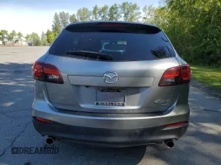2014 Mazda CX-9 Touring z VIN JM3TB3CV4E0438423, wystawiony jako Copart lot #58603325 z przebiegiem 81 177 mil mil oraz Czysty tytuł • Clean title. Historia ofert i sprzedaży dostępna na DreamBid. Obrazek 6.