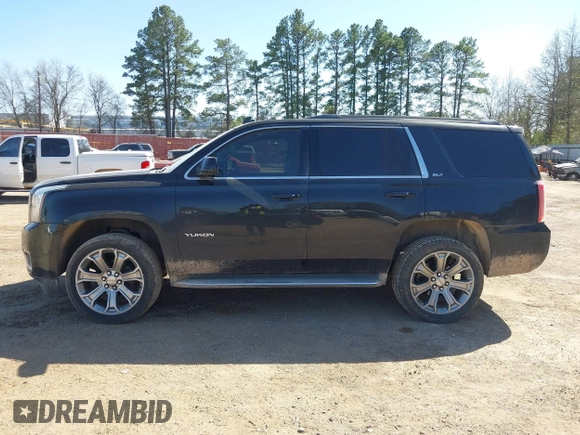 2015 GMC Yukon SLT z VIN 1GKS1BKC8FR112952, wystawiony jako IAAI lot #41836398 z przebiegiem 155 329 mil mil oraz . Historia ofert i sprzedaży dostępna na DreamBid. Obrazek 14.