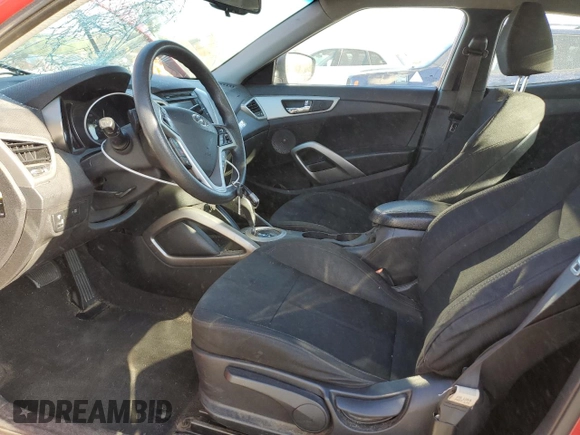 2014 Hyundai Veloster z VIN KMHTC6AD8EU213234, wystawiony jako Copart lot #53297535 z przebiegiem 131 769 mil mil oraz Szkoda całkowita • Salvage title. Historia ofert i sprzedaży dostępna na DreamBid. Obrazek 7.