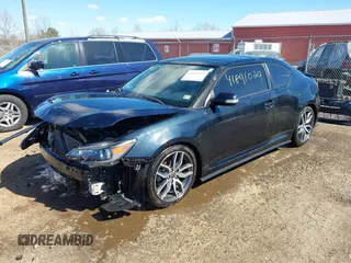 2016 Scion tC with VIN JTKJF5C71GJ020893, listed as a IAAI auction lot 41891029 with 76,341 mi miles. Bid and sale history available at carsss.com. Image 2.