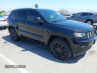 2017 Jeep Grand Cherokee 75th Anniversary with VIN 1C4RJEAG6HC956218, listed as a IAAI auction lot 42353950 with 113,398 mi miles and . Bid and sale history available at DreamBid. Image 1.
