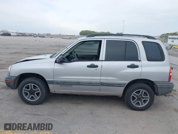 2003 Chevrolet Tracker z VIN 2CNBE134736919970, wystawiony jako IAAI lot #42203446 z przebiegiem 158 872 mil mil oraz . Historia ofert i sprzedaży dostępna na DreamBid. Obrazek 14.
