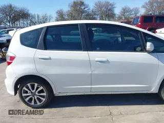 2013 Honda Fit Sport with VIN JHMGE8H54DC059358, listed as a IAAI auction lot 41776717 with 90,595 mi miles. Bid and sale history available at carsss.com. Image 20.