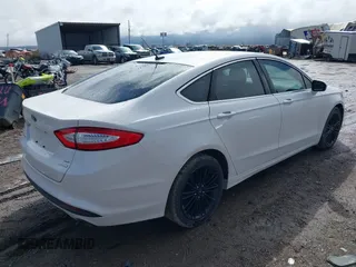 2014 Ford Fusion SE with VIN 3FA6P0HDXER178234, listed as a IAAI auction lot 41810469 with 162,013 mi miles. Bid and sale history available at carsss.com. Image 4.