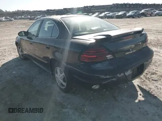 2004 Pontiac Grand Am SE with VIN 1G2NE52F74C226518, listed as a IAAI auction lot 41235829 with 215,862 mi miles. Bid and sale history available at carsss.com. Image 3.