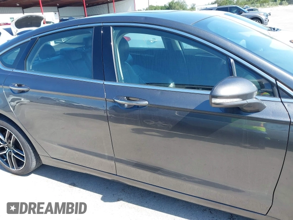 2019 Ford Fusion Titanium with VIN 3FA6P0D91KR104827, listed as a IAAI auction lot 42221526 with 141,316 mi miles and . Bid and sale history available at DreamBid. Image 13.