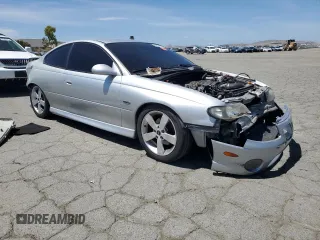 2006 Pontiac GTO z VIN 6G2VX12U16L565993, wystawiony jako Copart lot #57291015 z przebiegiem 190 257 mil mil oraz Szkoda całkowita • Salvage title. Historia ofert i sprzedaży dostępna na DreamBid. Obrazek 4.