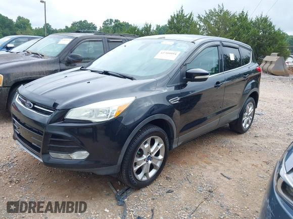 2013 Ford Escape SEL with VIN 1FMCU9H97DUA80867, listed as a IAAI auction lot 42709994 with Not provided miles and . Bid and sale history available at DreamBid. Image 2.