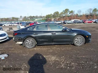2021 Hyundai Sonata Hybrid SEL with VIN KMHL34JJ1MA027058, listed as a IAAI auction lot 41187431 with 39,437 mi miles. Bid and sale history available at carsss.com. Image 14.