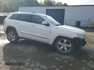 2013 Jeep Grand Cherokee Overland with VIN 1C4RJECG8DC526150, listed as a Copart auction lot 52038775 with 183,813 mi miles and Salvage Title. Bid and sale history available at DreamBid. Image 4.