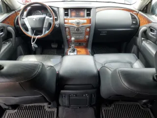 2016 Infiniti QX80 with VIN JN8AZ2NC7G9401032, listed as a Copart auction lot 58068015 with 159,842 mi miles and Salvage title. Bid and sale history available at DreamBid. Image 8.