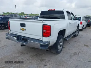2014 Chevrolet Silverado 1500 LT with VIN 3GCPCREC1EG446044, listed as a IAAI auction lot 42044614 with 145,590 mi miles and . Bid and sale history available at DreamBid. Image 4.