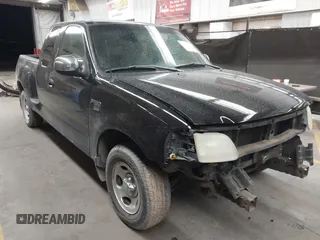 2001 Ford F-150 XL with VIN 1FTRX07W61KF82074, listed as a IAAI auction lot 41444721 with 125,494 mi miles. Bid and sale history available at carsss.com. Image 1.