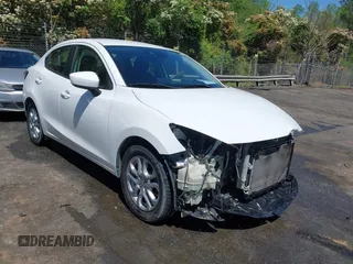2016 Scion iA z VIN 3MYDLBZVXGY122157, wystawiony jako IAAI lot #41991308 z przebiegiem 133 026 mil mil oraz . Historia ofert i sprzedaży dostępna na DreamBid. Obrazek 1.