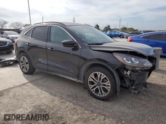 2020 Ford Escape SEL with VIN 1FMCU0H64LUB19432, listed as a Copart auction lot 50333285 with 77,135 mi miles and Salvage title. Bid and sale history available at DreamBid. Image 4.