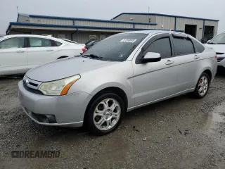 2009 Ford Focus SES with VIN 1FAHP36N89W236611, listed as a Copart auction lot 51090095 with 144,786 mi miles and Salvage Title. Bid and sale history available at DreamBid. Image 1.