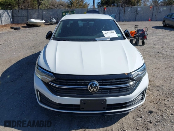 2023 Volkswagen Jetta Sport z VIN 3VWBM7BU2PM034287, wystawiony jako IAAI lot #41742935 z przebiegiem 32 818 mil mil oraz . Historia ofert i sprzedaży dostępna na DreamBid. Obrazek 12.