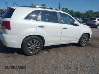 2012 Kia Sorento SX with VIN 5XYKWDA21CG253986, listed as a IAAI auction lot 42405849 with 218,540 mi miles and . Bid and sale history available at DreamBid. Image 4.