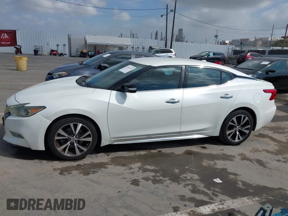 2016 Nissan Maxima S with VIN 1N4AA6AP2GC430689, listed as a IAAI auction lot 41913701 with 132,637 mi miles and . Bid and sale history available at DreamBid. Image 14.
