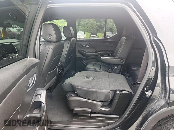 2022 Chevrolet Traverse LT with VIN 1GNERHKW6NJ133009, listed as a IAAI auction lot 42634836 with 90,143 mi miles and . Bid and sale history available at DreamBid. Image 17.