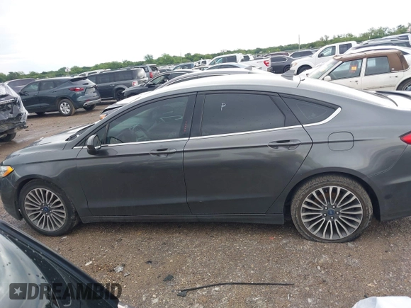 2020 Ford Fusion SE z VIN 3FA6P0HD5LR198744, wystawiony jako IAAI lot #42177820 z przebiegiem 97 520 mil mil oraz . Historia ofert i sprzedaży dostępna na DreamBid. Obrazek 14.