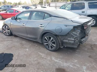 2020 Nissan Maxima SV with VIN 1N4AA6CV3LC371884, listed as a IAAI auction lot 41823571 with 83,441 mi miles and . Bid and sale history available at DreamBid. Image 3.