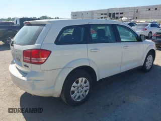 2014 Dodge Journey SE with VIN 3C4PDCAB2ET258681, listed as a IAAI auction lot 42558132 with 136,569 mi miles and . Bid and sale history available at DreamBid. Image 4.