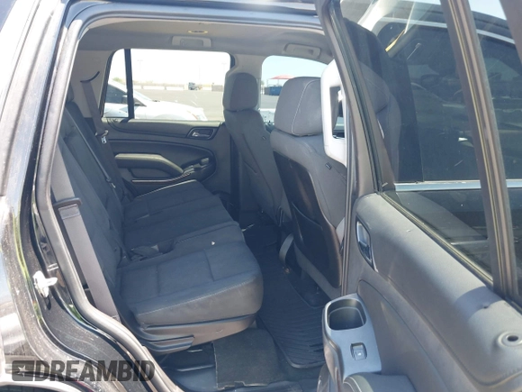 2015 Chevrolet Tahoe Commercial z VIN 1GNLC2EC0FR629983, wystawiony jako IAAI lot #42825604 z przebiegiem 112 410 mil mil oraz . Historia ofert i sprzedaży dostępna na DreamBid. Obrazek 8.