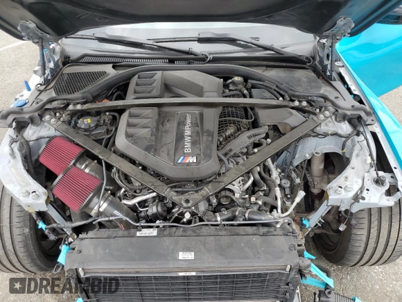 2021 BMW M4 with VIN WBS53AZ0XMCG52209, listed as a Copart auction lot 50234375 with 19,701 mi miles and Salvage title. Bid and sale history available at DreamBid. Image 13.