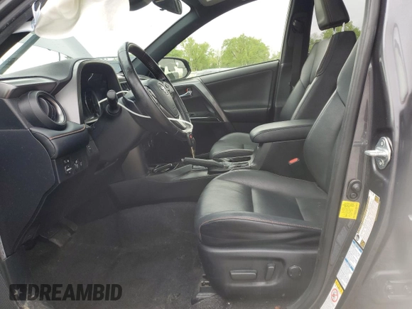 2018 Toyota RAV4 SE with VIN JTMJFREV2JJ730077, listed as a Copart auction lot 56666055 with 85,100 mi miles and Salvage title. Bid and sale history available at DreamBid. Image 7.