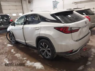 2021 Lexus RX with VIN 2T2HGMDA6MC064446, listed as a IAAI auction lot 41108859 with 116,930 mi miles. Bid and sale history available at carsss.com. Image 3.